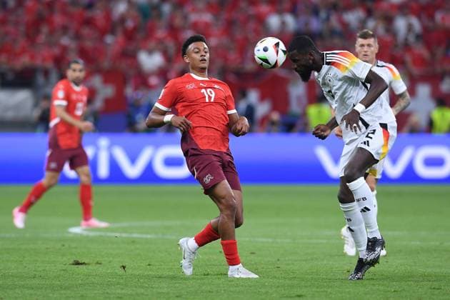 Soccer UEFA EURO 2024 group stage 3 matchday Switzerland Germany on 23 06 2024 at the Frankfurt Arena in Frankfurt Dan Ndoye Switzerland , left Antonio Rüdiger Germany , right xRx