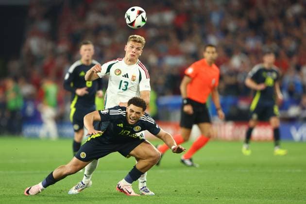 Chà Adams of Scotland and Andras Schäfer of Hungary Scotland v Hungary, UEFA European Championship, EM, Europameisterschaft 2024, Group A, Football, Stuttgart Arena, Stuttgart, Germany, 23 Jun 2024 EDITORIAL USE ONLY No use with unauthorised audio, video, data, fixture lists, club league logos or live services. Online in-match use limited to 120 images, no video emulation. No use in betting, games or single club league player publications. Copyright: xKieranxMcManus Shutterstockx 14548072az
