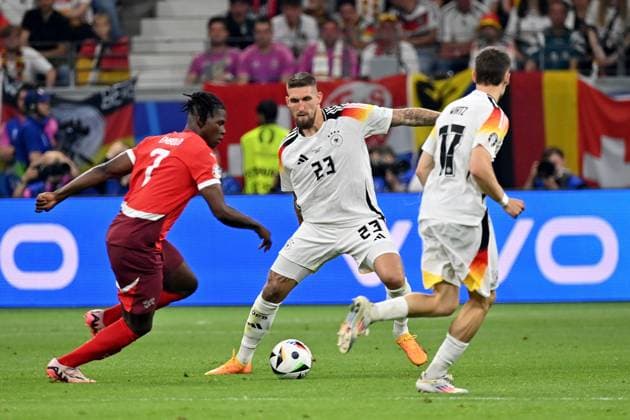 23 06 2024, xjrdrx, European Football Championship 2024, Switzerland Germany emspor, v l Breel Donald Embolo Switzerland Robert Andrich German National Football Team DFB Florian Wirtz German National Football Team DFB Zweikampf, Aktion, action, battle for the ball DFL DFB REGULATIONS PROHIBIT ANY USE OF PHOTOGRAPHS as IMAGE SEQUENCES and or QUASI VIDEO Frankfurt