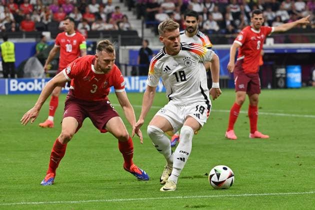 23 06 2024, xjrdrx, European Football Championship 2024, Switzerland Germany emspor, v l Silvan Widmer Switzerland Maximilian Mittelstädt German National Football Team DFB Zweikampf, Aktion, action, battle for the ball DFL DFB REGULATIONS PROHIBIT ANY USE OF PHOTOGRAPHS as IMAGE SEQUENCES and or QUASI VIDEO Frankfurt