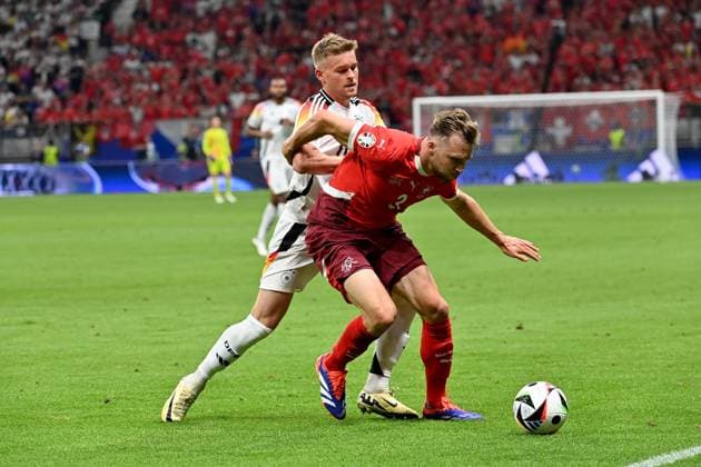 23 06 2024, xjrdrx, European Football Championship 2024, Switzerland Germany emspor, v l Maximilian Mittelstädt German National Football Team DFB Silvan Widmer Switzerland duel, action, action, battle for the ball DFL DFB REGULATIONS PROHIBIT ANY USE OF PHOTOGRAPHS as IMAGE SEQUENCES and or QUASI VIDEO Frankfurt