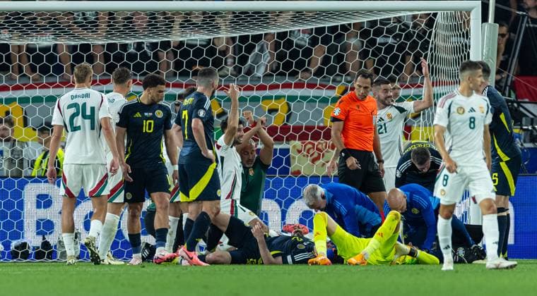 Football - UEFA EURO, EM, Europameisterschaft,Fussball 2024 - Group A - Scotland v Hungary STUTTGART, GERMANY - Sunday, June 23, 2024: Hungary s captain Dominik Szoboszlai calls for medics as team-mate Barnabas Varga lies injured during the UEFA Euro 2024 Group A match between Scotland and Hungary at the Stuttgart Arena. (Photo by David Rawcliffe Propaganda) STUTTGART Stuttgart Arena BADEN-WÜRTTEMBERG GERMANY  Copyright: xDavidxRawcliffex P2024-06-23-Scotland_Hungary-76