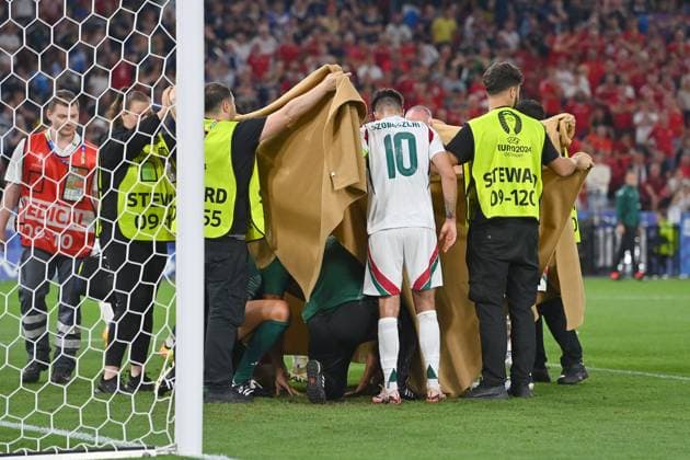 Collision Barnabas VARGA HUN with Anthony RALSTON Scotland , penalty area scene Emergency doctor intervention, fainting,K O group stage Group A Scotland SCO Hungary HUN on 23 06 2024, Stuttgart Arena Football UEFA EURO 2024 GERMANY from 14 06 2024 14 07 2024 Â
