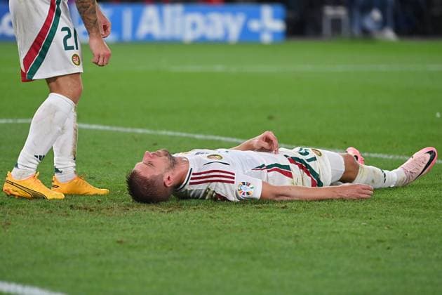 Collision Barnabas VARGA HUN with Anthony RALSTON Scotland , Penalty area scene Fainting,K O Group stage Group A Scotland SCO Hungary HUN on 23 06 2024, Stuttgart Arena Football UEFA EURO 2024 GERMANY from 14 06 2024 14 07 2024