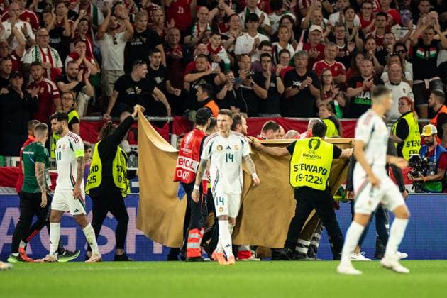 UEFA EURO 2024 Scotland Hungary 23 06 2024 one player of Hungary was injured, rescue service and stewards on the pitch UEFA EURO 2024 Scotland Hungary Stuttgart Stadium, Stuttgart 23 06 2024 Copyright: xBEAUTIFULxSPORTS Buriakovx