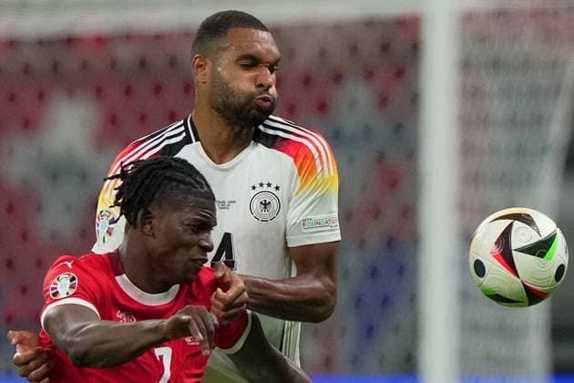 Germany s Jonathan Tah fight for the ball with Switzerland s Fabian Schar during the Euro 2024 soccer match between Switzerland and Germany at the Frankfurt Arena , Frankfurt , Germany - Sunday 23 June 2024. - Soccer .  Copyright: xSpada LaPressex
