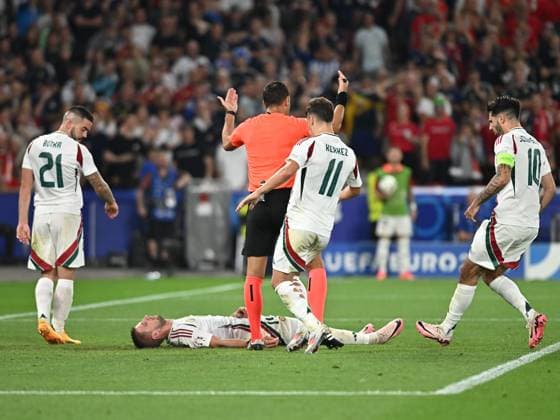 Barnabas Varga on the ground after an injury while Endre Botka, Milos Kerkez and Dominik Szoboszlai look on during the UEFA EURO 2024 football match between Scotland and Hungary at the Stuttgart Arena in Stuttgart, Sunday 23 June 2024 Cologne Copyright: xRazvanxPasarica SPORTxPICTURESx