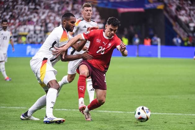 FRANKFURT AM MAIN, GERMANY JUNE 23 Fabian Rieder of Switzerland R fights for the ball with Jonathan Tah of Germany L during the UEFA EURO 2024 group stage match between Switzerland and Germany at Frankfurt Arena on June 23, 2024 in Frankfurt am Main, Germany Frankfurt am Main Frankfurt Arena Hesse Germany Copyright: xJustPictures.ch ManuelxWinterbergerx jp-en-EuSpIm-JP4_MAN_Scotland_Swiss_19Jun2024_CO_00084
