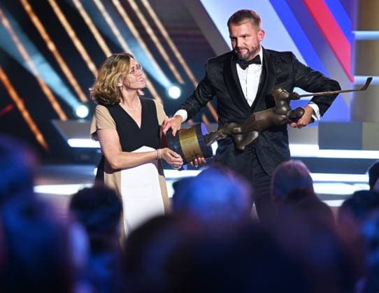 Gala evening to present Golden Stick award for the best Czech Ice hockey, Eishockey player of past season was held in Prague, Czech Republic, on June 23, 2024. The winner of the poll is hockey forward David Pastrnak, for whom his mother Marcela Ziembova (left) accepted the award. On the right side is seen moderator Libor Boucek. (CTKxPhoto MichaelaxRihova) CTKPhotoP2024062306855  CTKPhotoP2024062306855
