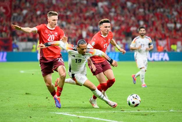 v l AEBISCHER Michel SUI , Leroy SANE GER , VARGAS Ruben SUI Action, duel, preliminary round 3 match day, group A, match M25, Switzerland SUI Germany GER , on 23 06 2024 in Frankfurt Germany European Football Championship 2024 from 14 06 14 07 2024 in Germany Â