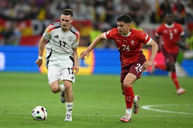 Florian Wirtz (Germany)Fabian Rieder (Switzerland) during the UEFA EURO, EM, Europameisterschaft,Fussball Germany 2024 match between Switzerland 1-1 Germany at Frankfurt Arena on June 23, 2024 in Frankfurt, Germany. Noxthirdxpartyxsales  (257435746)