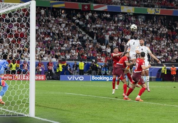 Soccer, Men, Season 2023 24, Euro EM 2024, Group A 3 Matchday in Frankfurt, Switzerland Germany 1 1 , Niclas Füllkrug r , Germany scores the goal to 1 1 against goalkeeper Yann Sommer not in picture, Switzerland , 23 06 2024, Copyright: xMatthiasxKochx