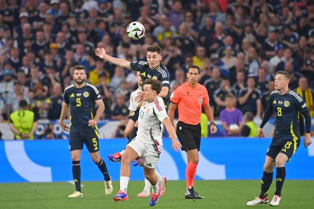 Billy GILMOUR Scotland , action,duel against Callum STYLES HUN Re Callum MCGREGROR Scotland Group Stage Group A Scotland SCO Hungary HUN 0 1, on 23 06 2024, Stuttgart Arena Football UEFA EURO 2024 GERMANY from 14 06 2024 14 07 2024