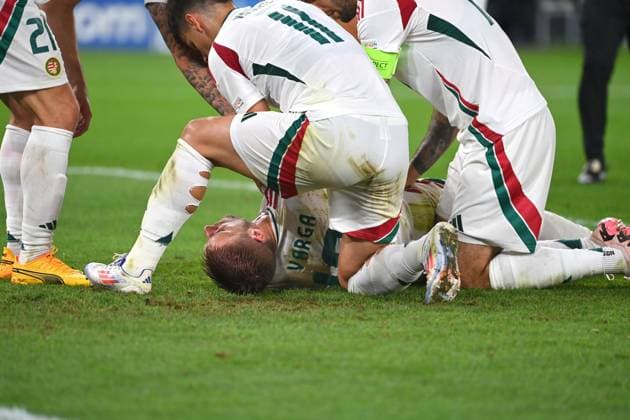 Collision Barnabas VARGA HUN with goalkeeper Angus GUNN Scotland , penalty area scene Fainting,K O teammates turn him aside Group stage Group A Scotland SCO Hungary HUN 0 1, on 23 06 2024, Stuttgart Arena Football UEFA EURO 2024 GERMANY from 14 06 2024 14 07 2024