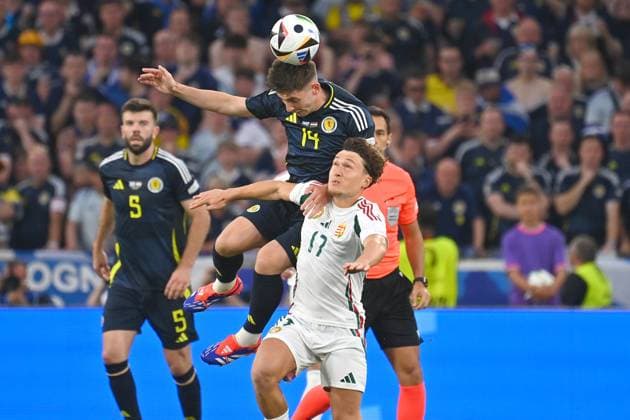 Billy GILMOUR Scotland , action,duel against Callum STYLES HUN Group stage Group A Scotland SCO Hungary HUN 0 1, on 23 06 2024, Stuttgart Arena Football UEFA EURO 2024 GERMANY from 14 06 2024 14 07 2024