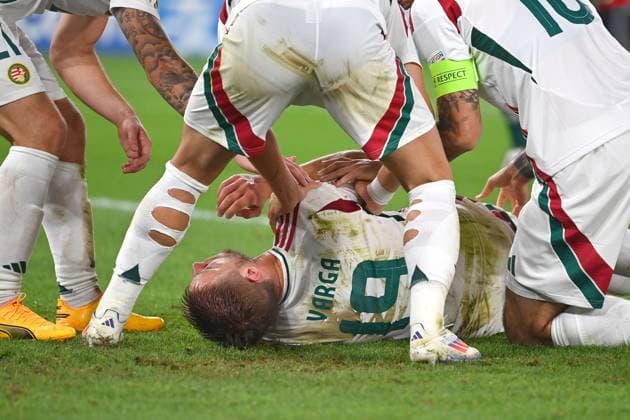 Collision Barnabas VARGA HUN with goalkeeper Angus GUNN Scotland , penalty area scene Fainting,K O teammates turn him aside Group stage Group A Scotland SCO Hungary HUN 0 1, on 23 06 2024, Stuttgart Arena Football UEFA EURO 2024 GERMANY from 14 06 2024 14 07 2024
