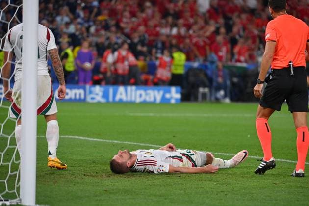 Collision Barnabas VARGA HUN with goalkeeper Angus GUNN Scotland penalty area scene Fainting,K O Emergency, Group stage Group A Scotland SCO Hungary HUN 0 1 on 23 06 2024, Stuttgart Arena Football UEFA EURO 2024 GERMANY from 14 06 2024 14 07 2024