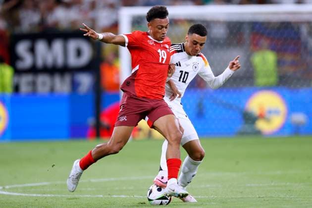 NDOYE Dan Team Switzerland with MUSIALA Jamal UEFA Football EURO 2024 in Germany Preliminary Round Match Group A Switzerland Germany 1 1 on 23 06 2024 in Frankfurt DFL REGULATIONS PROHIBIT ANY USE OF PHOTOGRAPHS as IMAGE SEQUENCES and or QUASI VIDEO Copyright: xLacixPerenyix
