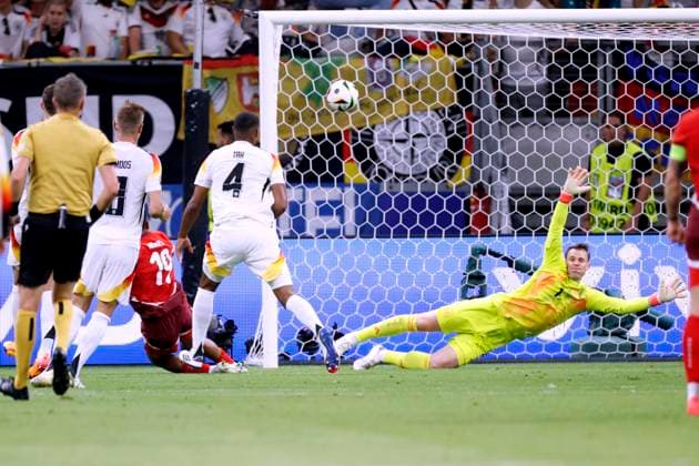 NDOYE Dan Team Switzerland Goal for 1 0 lead against goalkeeper NEUER Manuel UEFA Football EURO 2024 in Germany Preliminary Round Match Group A Switzerland Germany 1 1 on 23 06 2024 in Frankfurt DFL REGULATIONS PROHIBIT ANY USE OF PHOTOGRAPHS as IMAGE SEQUENCES and or QUASI VIDEO Copyright: xLacixPerenyix