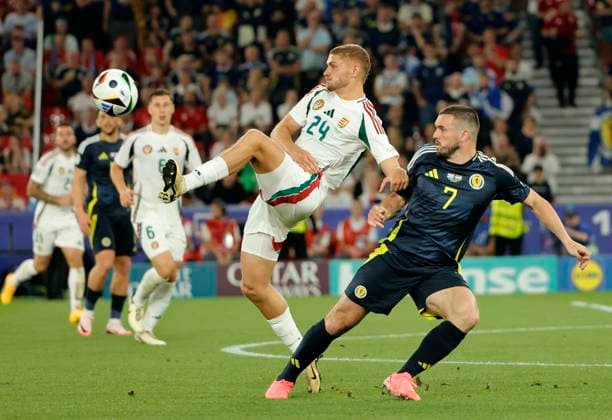 (240624) -- STUTTGART, June 24, 2024 -- Marton Dardai (2nd R) of Hungary vies with John McGinn of Scotland during the UEFA EURO, EM, Europameisterschaft,Fussball 2024 Group A match between Scotland and Hungary in Stuttgart, Germany, June 23, 2024. (Photo by Xinhua) (SP)GERMANY-STUTTGART-FOOTBALL-EURO 2024-SCOTLAND VS HUNGARY PhilippexRuiz 