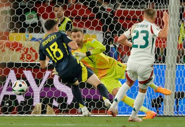 (240624) -- STUTTGART, June 24, 2024 -- Kevin Csoboth (R) of Hungary shoots during the UEFA EURO, EM, Europameisterschaft,Fussball 2024 Group A match between Scotland and Hungary in Stuttgart, Germany, June 23, 2024. (Photo by Xinhua) (SP)GERMANY-STUTTGART-FOOTBALL-EURO 2024-SCOTLAND VS HUNGARY PhilippexRuiz 