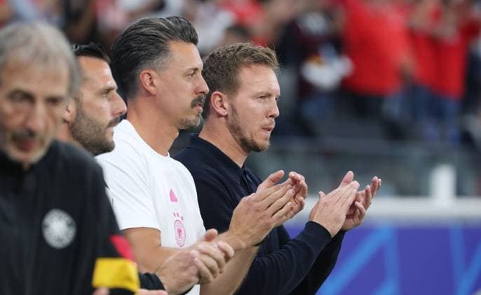 Co-coach Benjamin Glück, co-coach Sandro Wagner, coach Julian Nagelsmann after the anthem before the start of the match Sport Football Soccer European Championship Euro 2024 European Championship Men Season 2023 2024 23 06 2024 Switzerland SUI vs Germany GER in Frankfurt a M DFL regulations prohibit any use of photographs as image sequences and or quasi video