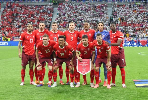 (240624) -- FRANKFURT, June 24, 2024 -- Starting players of Switzerland pose for a group photo before the UEFA EURO, EM, Europameisterschaft,Fussball 2024 Group A match between Germany and Switzerland in Frankfurt, Germany, June 23, 2024. ) (SP)GERMANY-FRANKFURT-FOOTBALL-EURO 2024-GERMANY VS SWITZERLAND ZhangxFan 