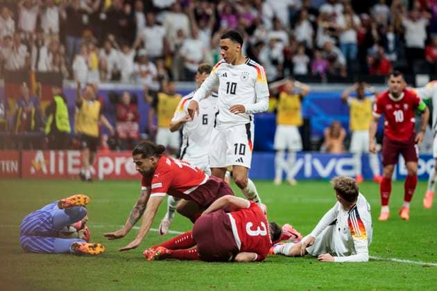 UEFA EURO 2024 Switzerland Germany 23 06 2024 Silvan Widmer Switzerland, 3 and Maximilian Beier Germany, 14 on the ground UEFA EURO 2024 Switzerland Germany Frankfurt Arena, Frankfurt on 23 06 2024 Copyright: xBEAUTIFULxSPORTS Wunderlx