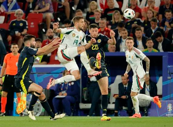 23 06 2024, European Football Championship, Scotland vs Hungary,MHP Stuttgart, Sport, in the picture Grant Hanley Scotland , Barnabas Varga Hungary , Scott McKenna Scotland , Bendeguz Bolla Hungary