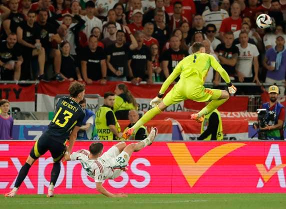 23 06 2024, European Football Championship, Scotland vs Hungary,MHP Stuttgart, Sport, in the picture Jack Hendry Scotland vs Roland Sallai Hungary , Angus Gunn Scotland