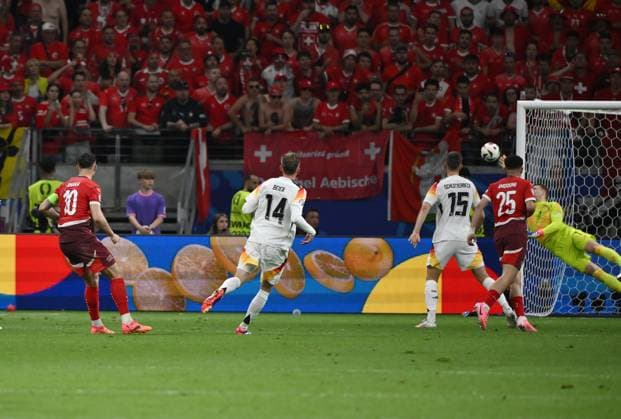 Goalkeeper Manuel Neuer Germany saves Granit Xhaka Switzerlands long-range shot , li 23 06 2024, European Football Championship 2024, Preliminary round, Matchday 3 Switzerland Germany 1 1 Frankfurt Frankfurt Arena Hessen Germany Team2