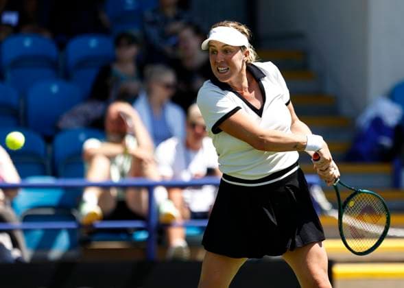24th June 2024; Devonshire Park, Eastbourne, East Sussex, England: Rothesay International Eastbourne, Day 1, Anastasia Pavlyuchenkova plays a backhand against Magda Linette (POL), womens singles match  ActionPlus12659763 HongboxChen