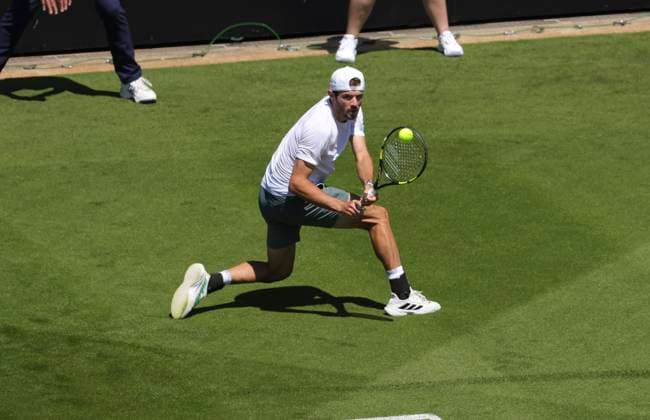 24th June 2024; Devonshire Park, Eastbourne, East Sussex, England: Rothesay International Eastbourne, Day 1; Jacob Fearnley (GBR) plays a backhand against Billy Harris(GBR), mens singles match  ActionPlus12659800 HongboxChen