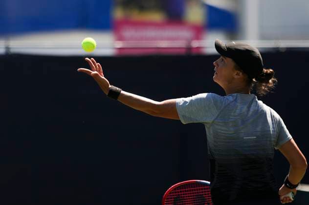 24th June 2024; Devonshire Park, Eastbourne, East Sussex, England: Rothesay International Eastbourne, Day 1, Anhelina Kalinina (UKR) serves to Sorana Cirstea (ROU) , womens singles match  ActionPlus12659781 HongboxChen
