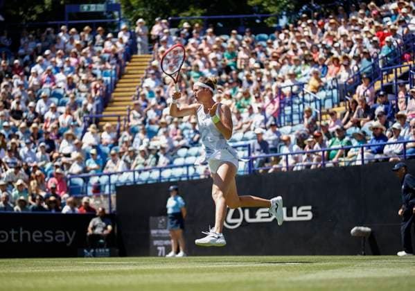 24th June 2024; Devonshire Park, Eastbourne, East Sussex, England: Rothesay International Eastbourne, Day 1, Marie Bouzkova (CZE) plays a forehand against Harriet Dart (GBR), womens singles match  ActionPlus12659814 HongboxChen
