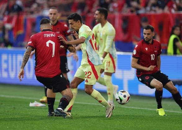 Jesus Navas of Spain is challenged by Rey Manaj of Albania Albania v Spain, UEFA European Championship, EM, Europameisterschaft 2024, Group B, Football, Dusseldorf Arena, Dusseldorf, Germany, 24 Jun 2024 EDITORIAL USE ONLY No use with unauthorised audio, video, data, fixture lists, club league logos or live services. Online in-match use limited to 120 images, no video emulation. No use in betting, games or single club league player publications.  Copyright: xPaulxCurrie Shutterstockx 14551058al