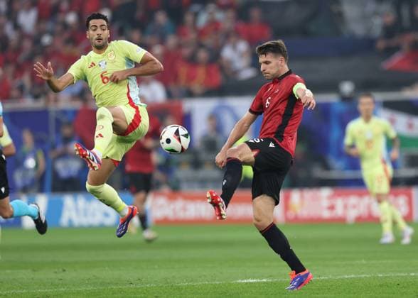 Dusseldorf, Germany, 24th June 2024. Mikel Merino of Spain tussles with Berat Djimsiti of Albania during the UEFA European Championships match at Dusseldorf Arena, Dusseldorf. Picture credit should read: David Klein Sportimage EDITORIAL USE ONLY. No use with unauthorised audio, video, data, fixture lists, club league logos or live services. Online in-match use limited to 120 images, no video emulation. No use in betting, games or single club league player publications. SPI-3204-0065