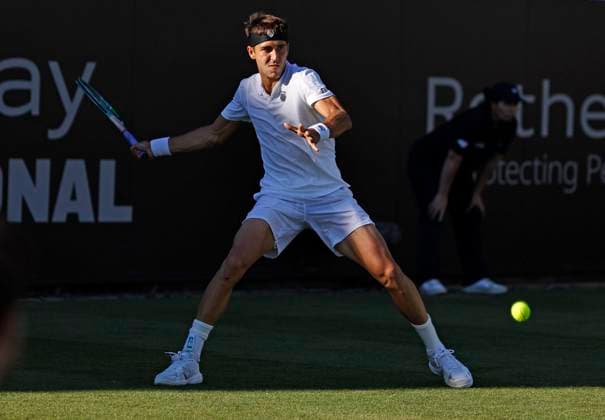 24th June 2024; Devonshire Park, Eastbourne, East Sussex, England: Rothesay International Eastbourne, Day 1; Tomas Martin Etchverry (ARG) plays a forehand against Juncheng Shang (CHN)  ActionPlus12660065 HongboxChen