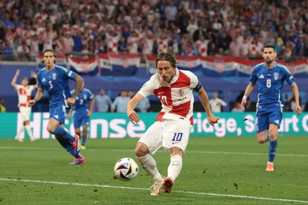 Leipzig, Germany, 24th June 2024. Luka Modric of Croatia scores to give the side a 1-0 lead during the UEFA European Championships match at Leipzig Stadium, Leipzig. Picture credit should read: Jonathan Moscrop Sportimage EDITORIAL USE ONLY. No use with unauthorised audio, video, data, fixture lists, club league logos or live services. Online in-match use limited to 120 images, no video emulation. No use in betting, games or single club league player publications. SPI-3190-0005