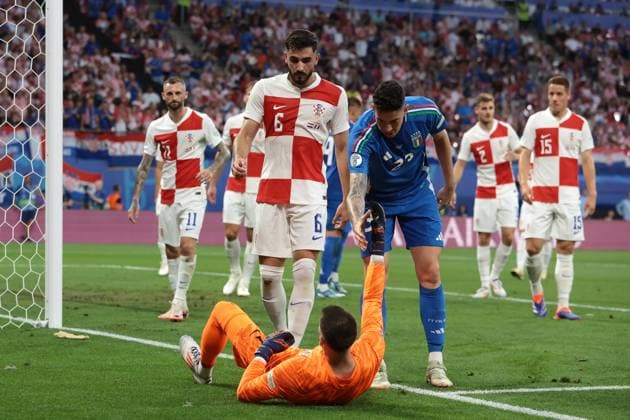 Leipzig, Germany, 24th June 2024. Alessandro Bastoni of Italy reacts after Dominik Livakovic of Croatia saved a point blank header from the Italian defender during the UEFA European Championships match at Leipzig Stadium, Leipzig. Picture credit should read: Jonathan Moscrop Sportimage EDITORIAL USE ONLY. No use with unauthorised audio, video, data, fixture lists, club league logos or live services. Online in-match use limited to 120 images, no video emulation. No use in betting, games or single club league player publications. SPI-3190-0017