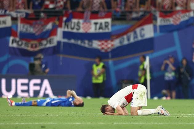 A dejected Josip Stanisic of Croatia after the full time whistle Croatia v Italy, UEFA European Championship, EM, Europameisterschaft 2024, Group B, Football, Leipzig Stadium, Leipzig, Germany, 24 Jun 2024 EDITORIAL USE ONLY No use with unauthorised audio, video, data, fixture lists, club league logos or live services. Online in-match use limited to 120 images, no video emulation. No use in betting, games or single club league player publications. Copyright: xMattxWest Shutterstockx 14551036cy