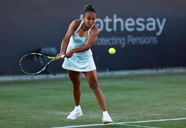 24th June 2024; Devonshire Park, Eastbourne, East Sussex, England: Rothesay International Eastbourne, Day 1, Leylah Fernandez (CAN) plays a backhand against Barbora Krejcikova (CZE) womens singles match  ActionPlus12660109 HongboxChen
