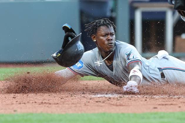 June 24, 2024: Miami Marlins outfielder Jazz Chisholm Jr. (2) slides into home plate safe scoring a run against the Kansas City Royals during the third inning at Kauffman Stadium in Kansas City, MO. CSM Kansas City United States of America - ZUMAc04_ 20240624_zma_c04_010 Copyright: xDavidxSmithx