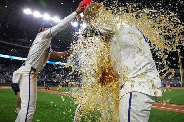 June 24, 2024: Kansas City Royals catcher Salvador Perez (13) is doused by teammates after their victory over the Miami Marlins at Kauffman Stadium in Kansas City, MO. CSM Kansas City United States of America - ZUMAc04_ 20240624_zma_c04_035 Copyright: xDavidxSmithx