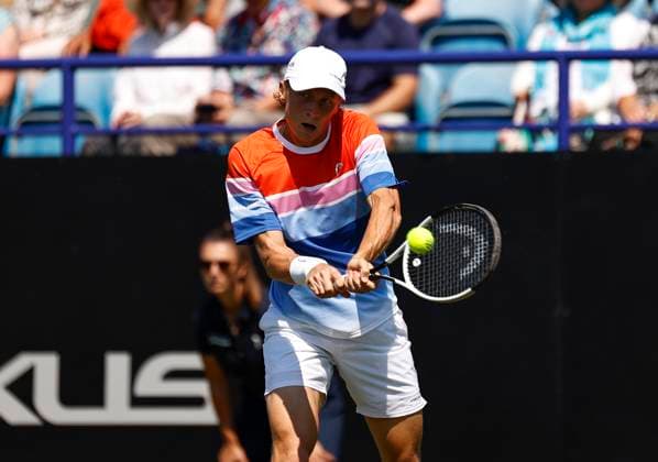 25th June 2024; Devonshire Park, Eastbourne, East Sussex, England: Rothesay International Eastbourne, Day 2; Emil Ruusuvuori (Fin) plays a backhand against Cameron Norrie (GBR) mens singles  ActionPlus12660299 HongboxChen