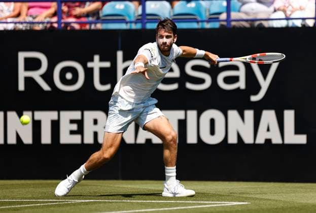 25th June 2024; Devonshire Park, Eastbourne, East Sussex, England: Rothesay International Eastbourne, Day 2; Cameron Norrie (GBR) plays a forehand against Emil Ruusuvuori (Fin) mens singles  ActionPlus12660303 HongboxChen
