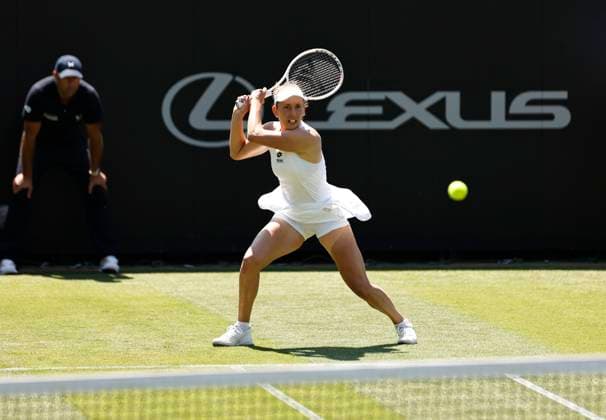 25th June 2024; Devonshire Park, Eastbourne, East Sussex, England: Rothesay International Eastbourne, Day 2, Elise Mertens (BEL) plays a backhand against Yuriko Miyazaki (GBR) womens singles  ActionPlus12660333 HongboxChen
