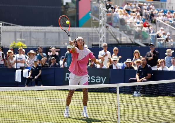 25th June 2024; Devonshire Park, Eastbourne, East Sussex, England: Rothesay International Eastbourne, Day 2; Zhizhen Zhang (CHN) plays a forehand against Miomir Kecmanovic (SRB)  ActionPlus12660374 HongboxChen