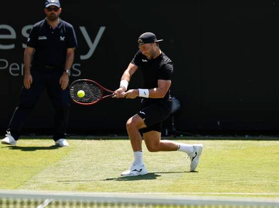 25th June 2024; Devonshire Park, Eastbourne, East Sussex, England: Rothesay International Eastbourne, Day 2; Liam Broady (GBR) plays a backhand against Yoshihito Nishioka (JPN) mens singles  ActionPlus12660363 HongboxChen