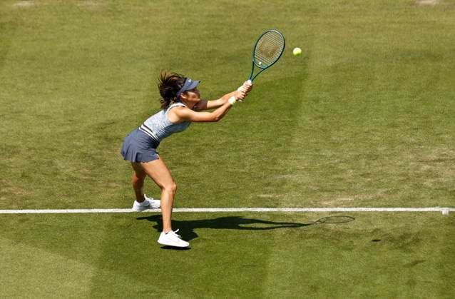 25th June 2024; Devonshire Park, Eastbourne, East Sussex, England: Rothesay International Eastbourne, Day 2, Emma Raducanu (GBR) plays a backhand against Sloane Stephens (USA)) womens singles  ActionPlus12660385 HongboxChen